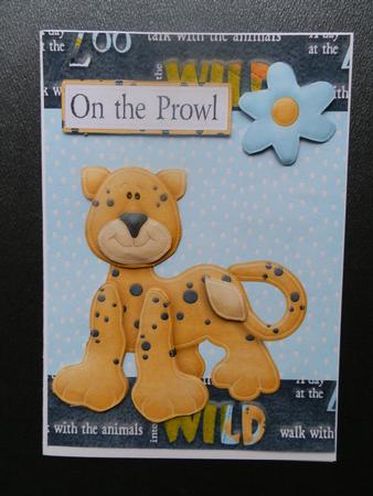 Cute Leopard with Blue Corner Flower by Julie McGregor