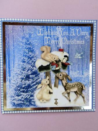 Cute Animals in the Snow with Christmas Tree by Julie McGregor