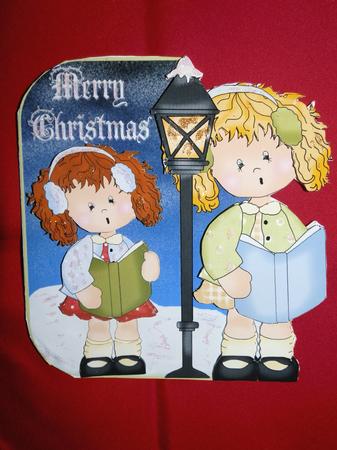 Sisters Carol Singing by Julie McGregor