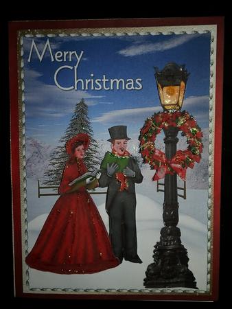 Lovely Carolers in the Snow . by Julie McGregor