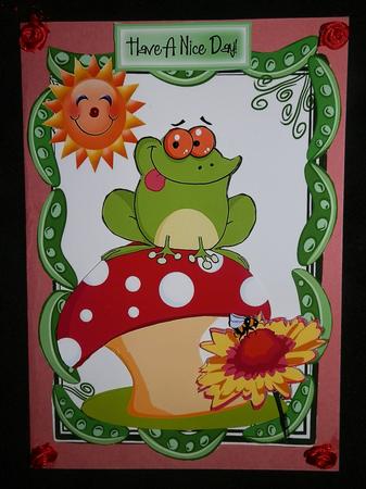 Cheeky Frog on a Mushroom in a Pea Frame with Sunflower by Julie McGregor