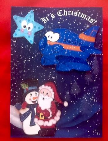 Toonie Plane in the Snow with Santa and Snowman by Julie McGregor