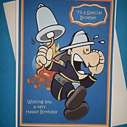 Male birthday card with funny cartoon fireman image by Julie Hassall