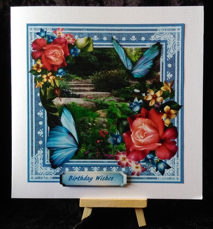 Beautiful Roses and Blue Butterfly's by Karen Bowes