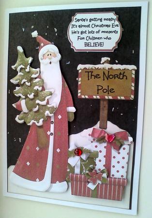 Santas Getting Ready for Christmas by Karen Davies