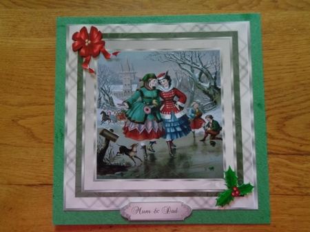 Christmas card with vintage skating scene and family tags by Karen Faulds
