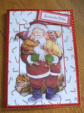 Jolly Vintage Santa with Children in Candycane Frame by Karen Faulds