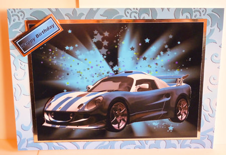 Sports Car on Blue Star Background by Karen Nash