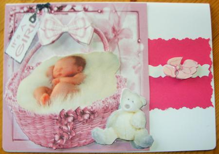 Baby Girl in Pink Basket by Kathleen Francis