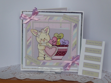 Rabbit and a cup full of love hearts by Kathleen Peace