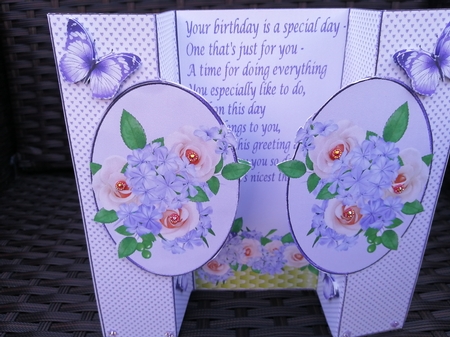 Pretty peach/purple flowers with butterflies cut out by Kathleen Collison