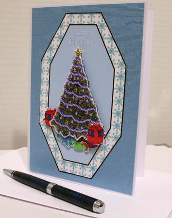 Gifts Under the Tree by Kelly Guastello