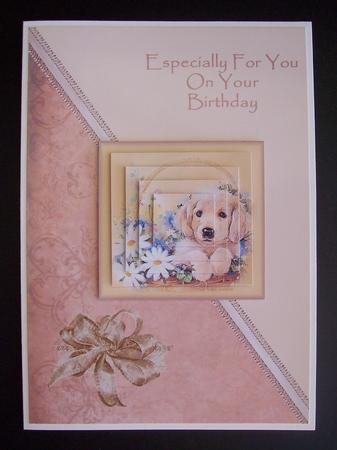 Puppy in Basket Pyramdi Card Front by Kelly Hannan