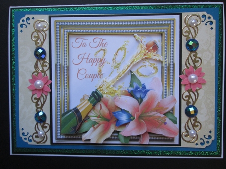Champagne Bottle With Lillies 8x8 by Kelly Patterson
