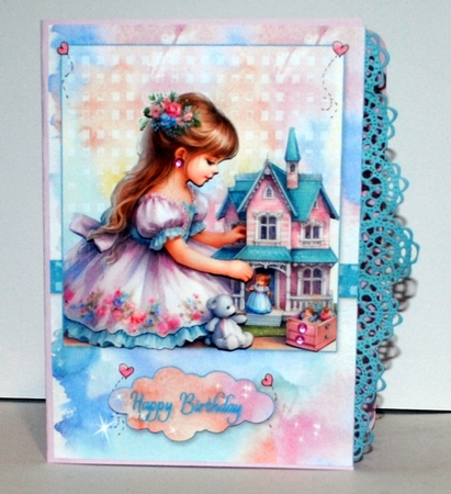 Birthday Girl Playing with her Dolls House by Kristina Norbat