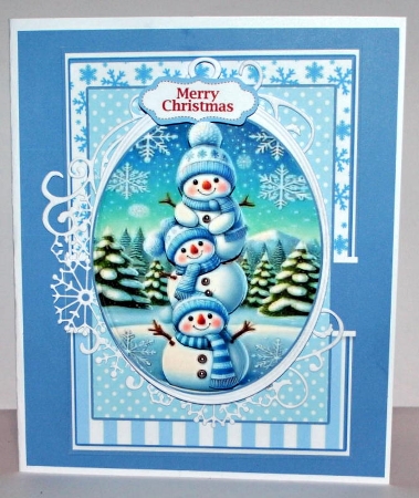 Pretty Blue Christmas Snowman Scene by Kristina Norbat