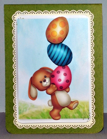 Easter bunny carrying eggs by Kristina Norbat
