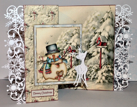 Snowman with his bird friends by Kristina Norbat