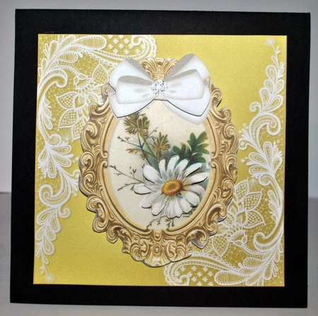 two pretty ornate gold frame toppers with white daisies & bow by Kristina Norbat