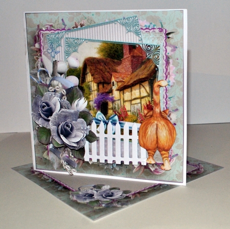 Thatched roof cottage and rose by Kristina Norbat