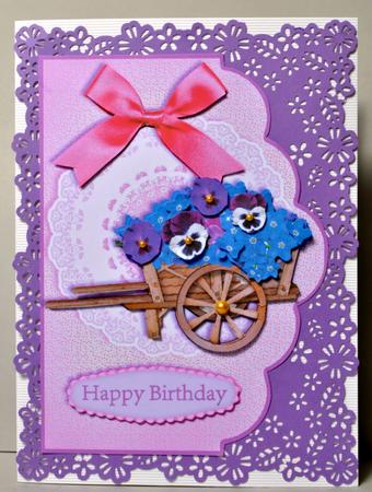 Pansies & Forgetmenots Wheelbarrow by Kristina Norbat