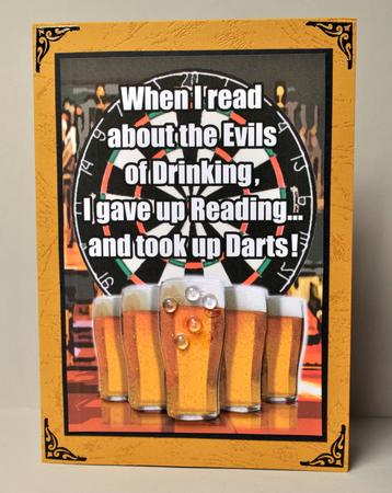 Dartboard and Pints of Beer on Pub Bar by Kristina Norbat