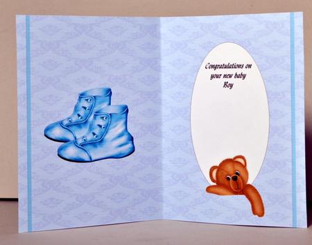 New Baby Boy with Shoes and Plushie by Kristina Norbat