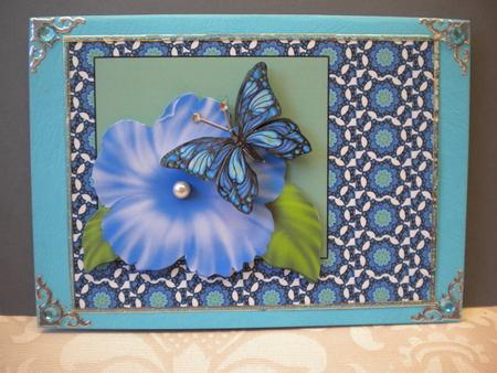 Fantasy Butterfly on Blue Petunia by Kristina Norbat