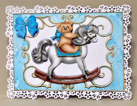 Teddy on Rocking Horse with Blue Bow by Kristina Norbat