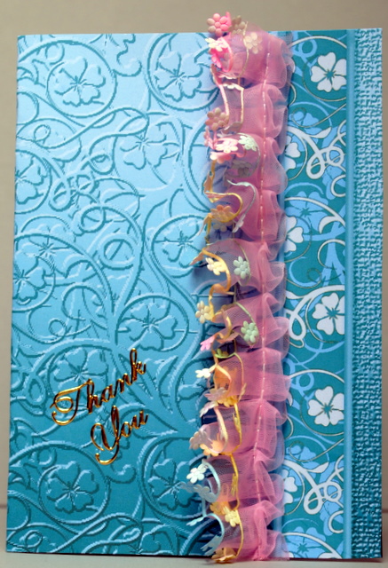 Aqua Swirls and Flowers Embossed with Border by Kristina Norbat