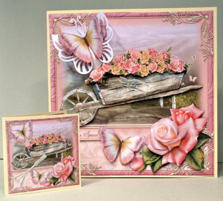 Pink Roses Wheelbarrow by Kristina Norbat