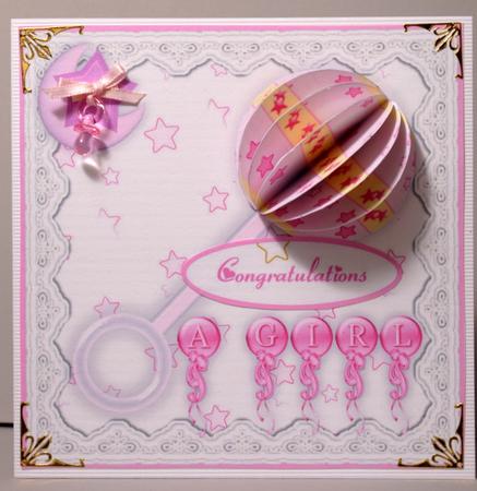 3D Baby Girl Rattle Embellishment and Card Front by Kristina Norbat