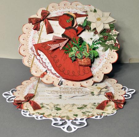 Arranging the Christmas Flowers Scalloped Round Easel Card by Kristina Norbat