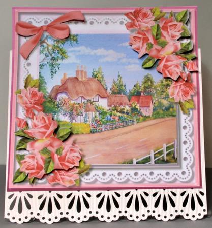 Beautiful Swann Cottage and Pink Roses  by Kristina Norbat
