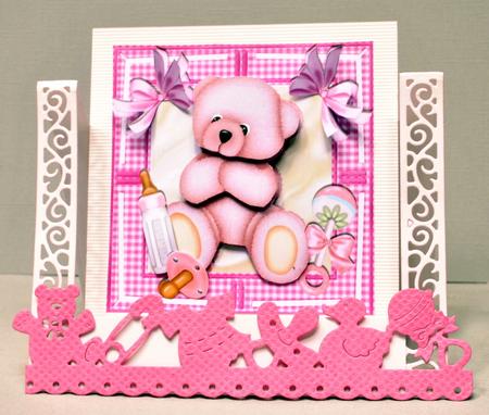 Pink Cuddly Baby Bear with Rattle and Bottle A4 by Kristina Norbat