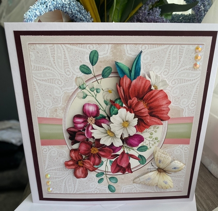 Mixed flowers and butterfly 7x7 by Kym Barry