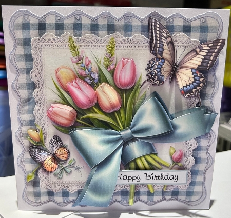 floral tulips on lace 2 by Kym Barry