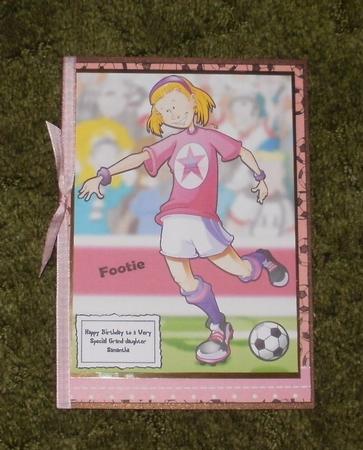 Pink and Purple Football Girl A4. by Kym Upshaw