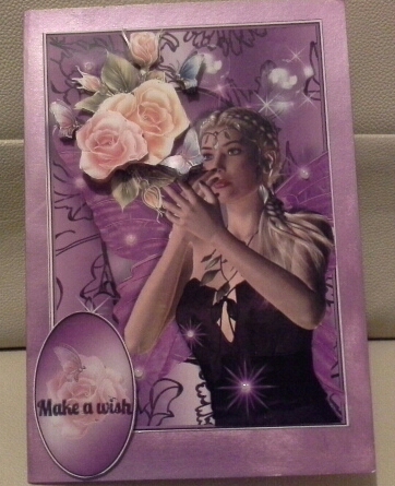 Butterfly Fairy in a Purple Swirl Frame by Laine HADLOW