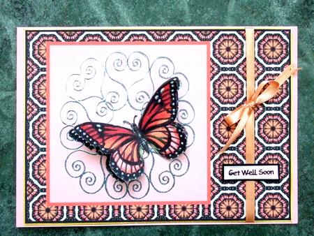 Orange Butterfly on Silver Scrolls by Laraine Spink