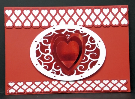 Scrolled mat with Hearts and heart ribbon borders by Laura Nicholls