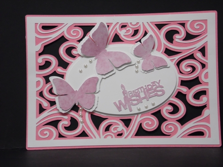 Swirly background with butterflies topper by Laura Nicholls