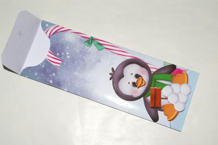 Christmas Candy Penguin Cutlery Wrap by Laura Nicholls