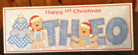 First Christmas Teddies Theo Large Dl by Lesley Earing