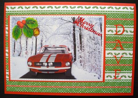 Red Sports Car in Snow Scene with Holly by Lesley Earing