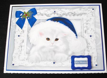 Fluffy White Kitten in Blue Santa Hat with Bow A4 by Lesley Earing