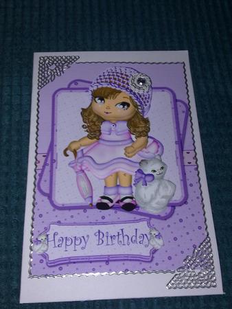 Dolly in a Lilac Hat with Her Cat Card Front by Lianne Elvidge