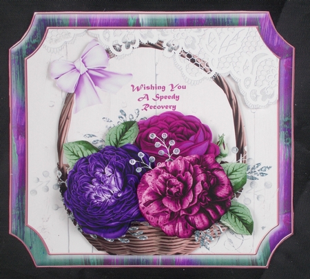 Basket of mauve roses by Linda Short