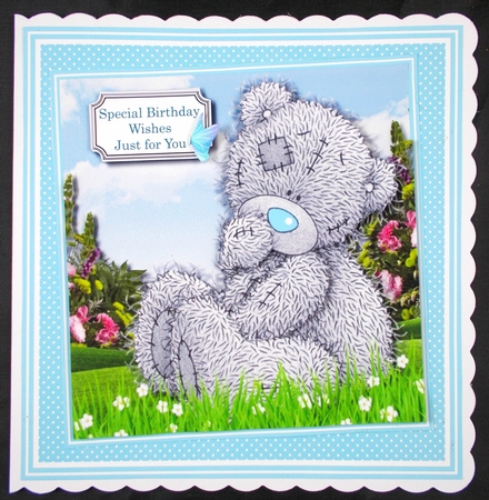 Tatty teddy sat among the flowers by Linda Short