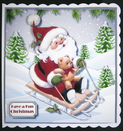 Santa and teddy sledging by Linda Short